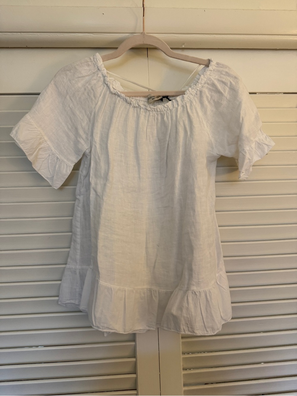Women’s White Ruffle-Hem Peasant Blouse
